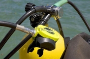 Diving regulator attatched to scuba tank. Diving regulator attatched to scuba tank.