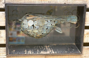Model of pufferfish at the entrance to restaurant specialising in Fugu, the flesh of poisonous pufferfish, considered a delicacy but also causes the death of some patrons each year. Model of pufferfish at the entrance to restaurant specialising in Fugu, the flesh of poisonous pufferfish, considered a delicacy but also causes the death of some patrons each year.