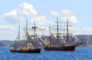 Pair of schooners under partial sail. Pair of schooners under partial sail.