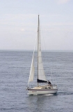 Yacht sailing in calm waters. Yacht sailing in calm waters.