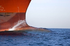 Bulbous bow of container ship. Breaks water tension to reduce drag. Bulbous bow of container ship. Breaks water tension to reduce drag.