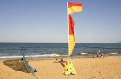 Swimming enclosure on tropical ocean beach with netting to provide protection for swimmers against potentially fatal jellyfish stings. Swimming enclosure on tropical ocean beach with netting to provide protection for swimmers against potentially fatal jellyfish stings.