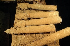 Large artillery shells balanced on beam in hold in the Heian Maru, Japanese WW II shipwreck. Large artillery shells balanced on beam in hold in the Heian Maru, Japanese WW II shipwreck.
