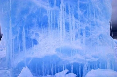 Icicles on blocks of sea ice at dusk pushed up by pressure from wind and tides. Icicles on blocks of sea ice at dusk pushed up by pressure from wind and tides.