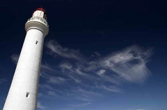 Lighthouse with high cloud. Lighthouse with high cloud.