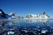 Rocky peaks on icy shoreline of Antarctica. Rocky peaks on icy shoreline of Antarctica.