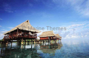 Accommodation huts over lagoon. Accommodation huts over lagoon.
