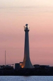 Lighthouse beacon at dusk. Lighthouse beacon at dusk.