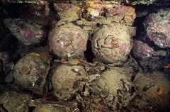 Land mines stacked in forward hold of the San Francisco Maru, Japanese WW II shipwreck.