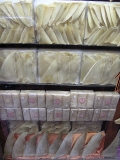 Dried Shark Fins in seafood shop window. High quality single fins (bottom) Dried Shark Fins in seafood shop window. High quality single fins (bottom)