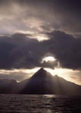 Snow covered mountains and clouds in Arctic Norway. Snow covered mountains and clouds in Arctic Norway.