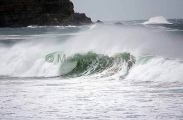 Surf breaking over sand bar. Surf breaking over sand bar.