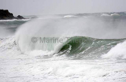 Surf breaking with offshore wind. Surf breaking with offshore wind.