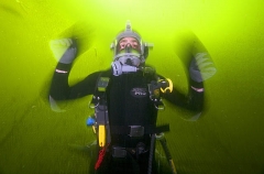 Commercial diver with surface supply air system and intercom mask. Commercial diver with surface supply air system and intercom mask.