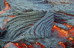 Cooling lava flowing to the sea. Cooling lava flowing to the sea.
